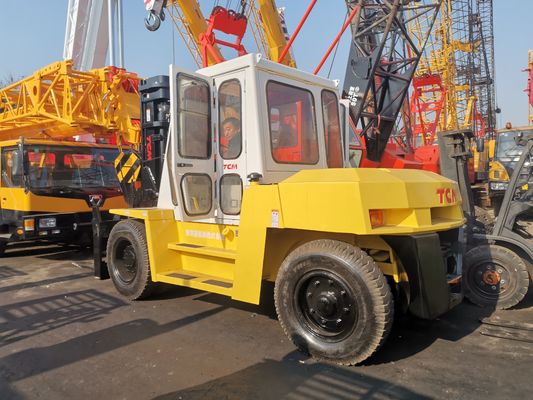 TCM FD100 Diesel Forklift Used on Construction Site with Routine Fork Length Assured