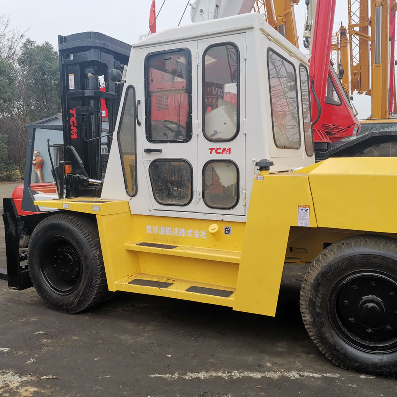 TCM FD100 Diesel Forklift Used on Construction Site with Routine Fork Length Assured